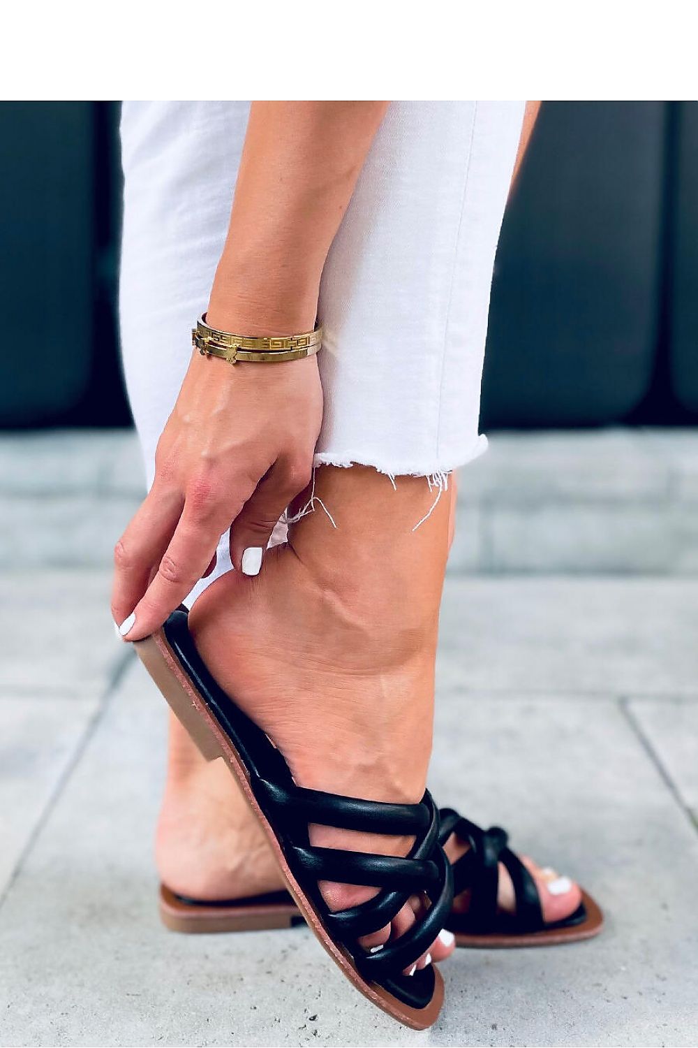 Clacquettes model 167472 Inello